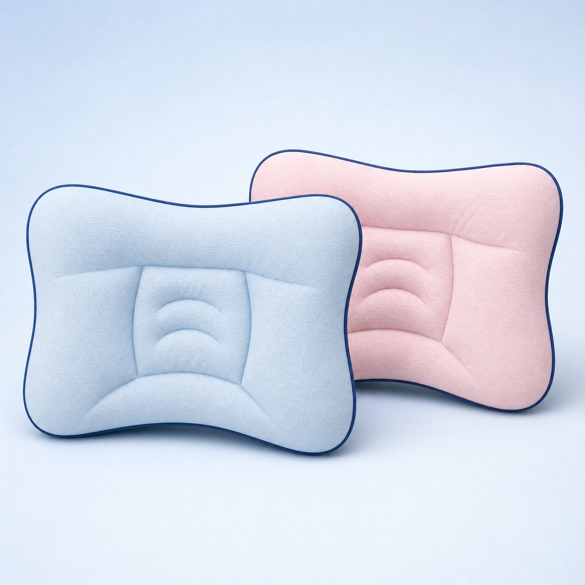 Funda protectora Nidito en azul y rosa para almohada infantil